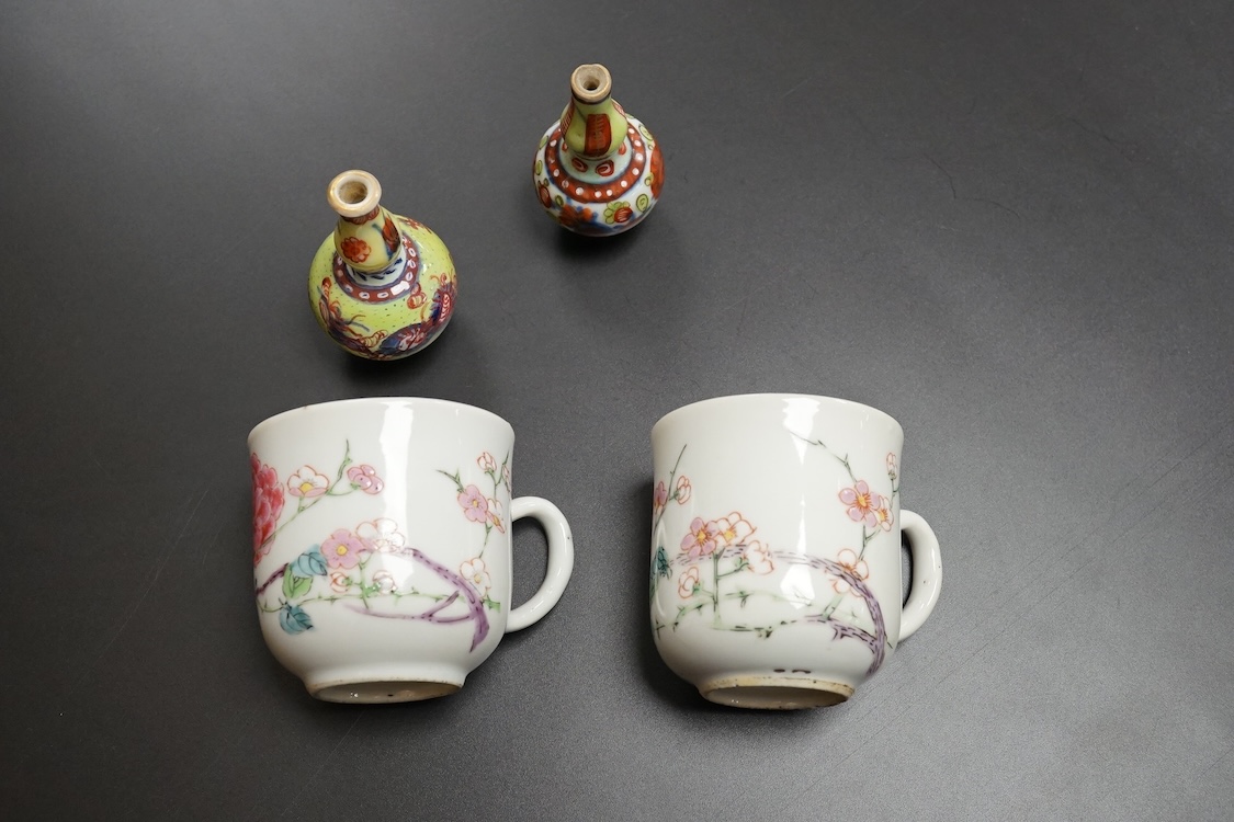 Two Chinese famille rose cups, Yongzheng period and two miniature clobbered vases, largest 6cm high